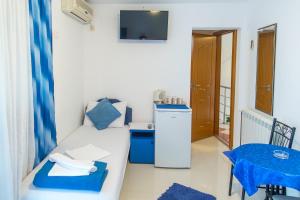 TV a/nebo společenská místnost v ubytování Guest House Vucicevic