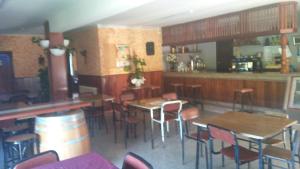 The lounge or bar area at Albergue O Corisco