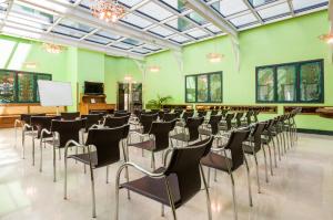 a room with a bunch of chairs in it at Hotel Julia in Madrid