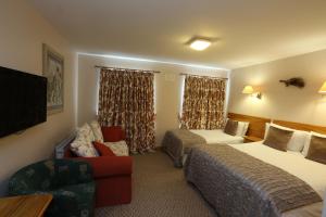 Giường trong phòng chung tại The Keepers Arms