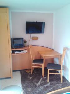 TV a/nebo společenská místnost v ubytování ApartmányDanielova