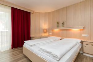 Postelja oz. postelje v sobi nastanitve Hotel Christian
