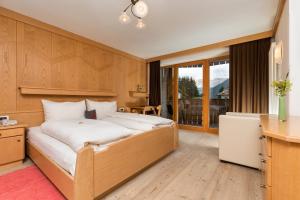Postelja oz. postelje v sobi nastanitve Hotel Christian