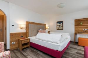 Postelja oz. postelje v sobi nastanitve Hotel Christian
