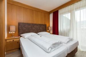 Postelja oz. postelje v sobi nastanitve Hotel Christian