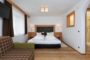 Postelja oz. postelje v sobi nastanitve Hotel Christian