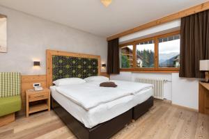 Postelja oz. postelje v sobi nastanitve Hotel Christian