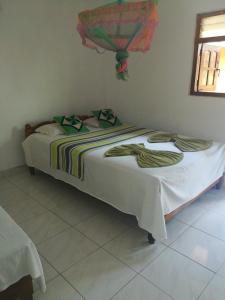 Кровать или кровати в номере Walawe Park View Hotel