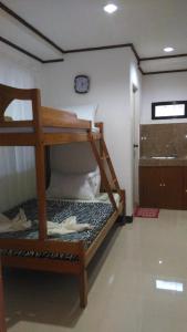 Postel nebo postele na pokoji v ubytování Sealor Pension House