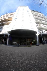a large white building with a large window at Cristal Palace Hotel in Buenos Aires