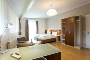 Postel nebo postele na pokoji v ubytování Seehörnle Bio Hotel & Gasthaus