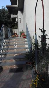 a set of stairs leading up to a house at Il corbezzolo in Linguaglossa