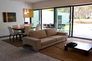 Zona de estar de Design House Aroeira Golf