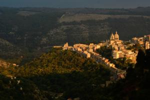 an aerial view of a city on a hill at Terrazzo su Ibla in Ragusa