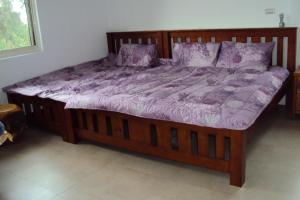 Postel nebo postele na pokoji v ubytování Shan Hu Lian Homestay