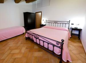 Katil atau katil-katil dalam bilik di Villa Martina