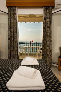 Postel nebo postele na pokoji v ubytování Lazaridis Luxury Studios & Apartments