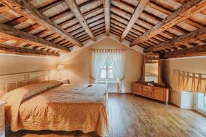 Säng eller sängar i ett rum på Villa Stanzia Cocci