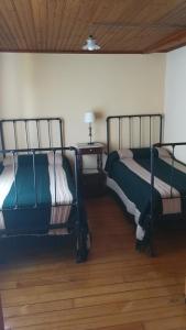 Postel nebo postele na pokoji v ubytování Casiña de Meyre