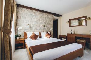Letto o letti in una camera di Carrubba