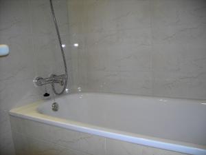 Koupelna v ubytování Hotel Agorreta + 18 fotografií