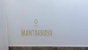 Un certificado, premio, letrero u otro documento en The Mantarraya Outpost