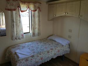 Cama o camas de una habitación en Camping Iznate