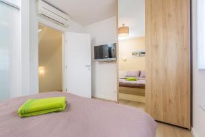 Postel nebo postele na pokoji v ubytování Villa Nika