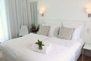 Letto o letti in una camera di Berdorfer Eck - Bed&Breakfast