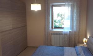 A bed or beds in a room at B&B la Palma