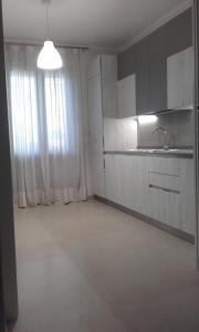 A kitchen or kitchenette at B&B la Palma