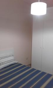 A bed or beds in a room at B&B la Palma