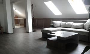 Ein Sitzbereich in der Unterkunft Apartment Setaliste
