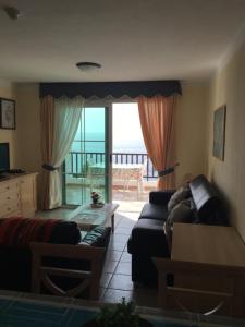 Et opholdsområde på Apartamentos Rocas del Mar