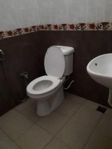 Kylpyhuone majoituspaikassa D'Airport Homestay & Transit Rooms