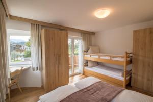 Rúm í herbergi á Haus Reintal