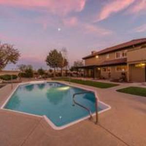 a swimming pool in front of a house at Hacienda De Suenos in Paso Robles +8 photos