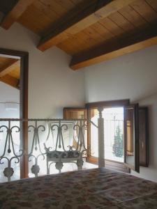 Voodi või voodid majutusasutuse Villa Scalabrini toas
