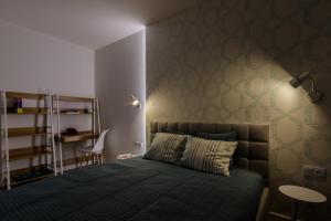 Łóżko lub łóżka w pokoju w obiekcie Apartamenty City View od WroclawApartament-pl