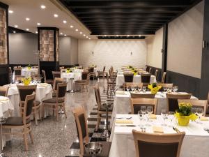 Reštaurácia alebo iné gastronomické zariadenie v ubytovaní Al Vecchio Cellaio Historical Guest House