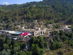 an aerial view of a house on a mountain at Bkerzay in Baakleen