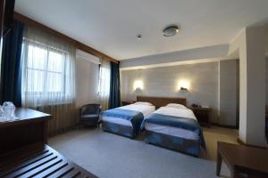 Katil atau katil-katil dalam bilik di Hotel Prestige