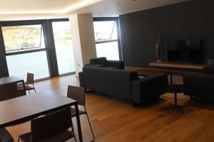 Posezení v ubytování Hotel U Viveiro