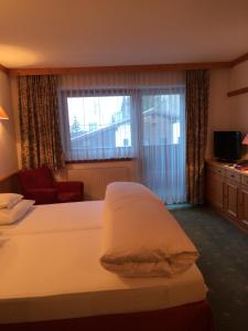 Katil atau katil-katil dalam bilik di Hotel Garni Senn