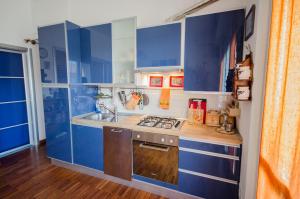 Kuhinja oz. manjša kuhinja v nastanitvi Minzoni Apartment