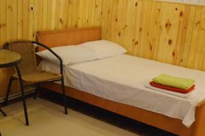 Cama o camas de una habitación en Cottages On Gdantsevskaya Street