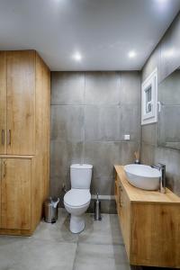 Kúpeľňa v ubytovaní Heliconia deluxe Apt Must