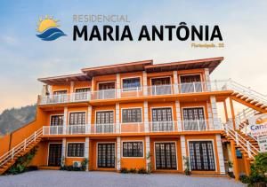 un bâtiment portant le logo de maria antononda dans l'établissement Residencial Maria Antonia, à Florianópolis