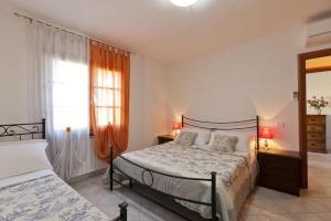 Rúm í herbergi á Borgo Guglielmo