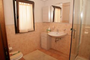 Koupelna v ubytování L'Isola Felice Apartment